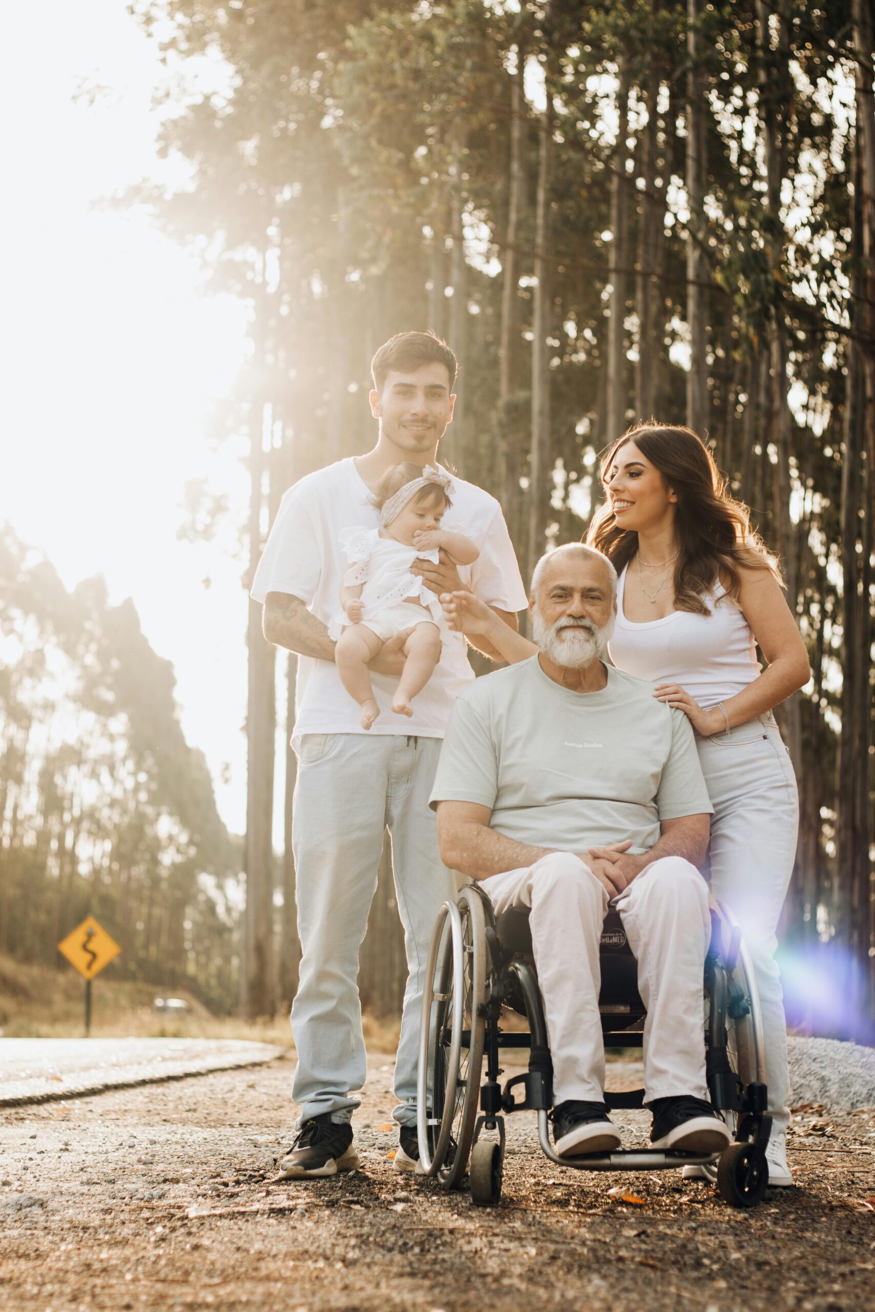 Multi-generational family outdoors in golden light